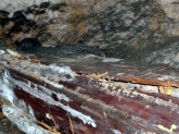 Snake on a coffin inside a burial cave, Ke'te Kesu, Toraja